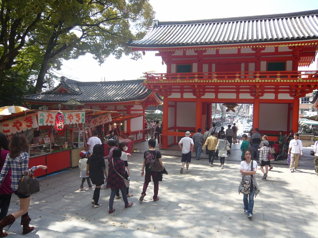 p1020232.jpg - The whole park has a carnival atmosphere at this time of year.  This is the gate of the park looking out into Gion.